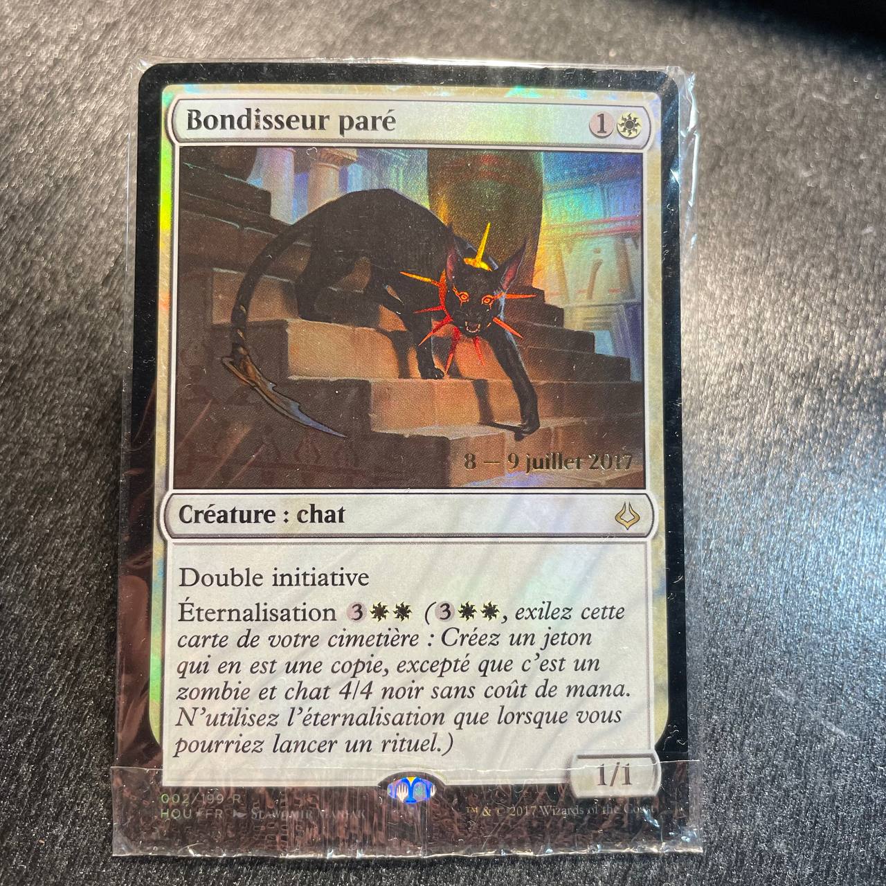 Adorned Pouncer FOIL prerelease (FR)